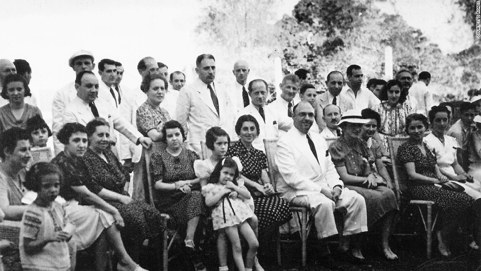 From 1937 to 1941, about 1,200 European Jews found refuge from the Holocaust in the Philippines. Their migration was part of an effort by the Philippines president, Manuel Quezon, the Jewish-American Frieder family, and an American official, Paul McNutt. Several of the Jewish refugees pose with Mr. and Mrs. Alex Frieder in this 1940 picture in the Philippines.