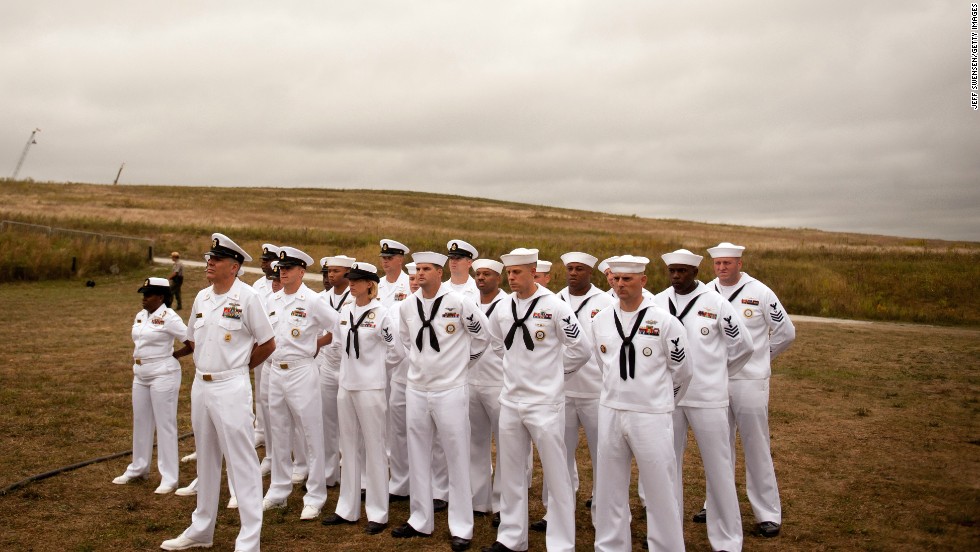 A group from the U.S. Navy gathers Thursday, September 11, at the Flight 93 National Memorial in Shanksville, Pennsylvania. This year marks the 13th anniversary of the September 11 terrorist attacks that killed nearly 3,000 people in New York, Washington and western Pennsylvania.