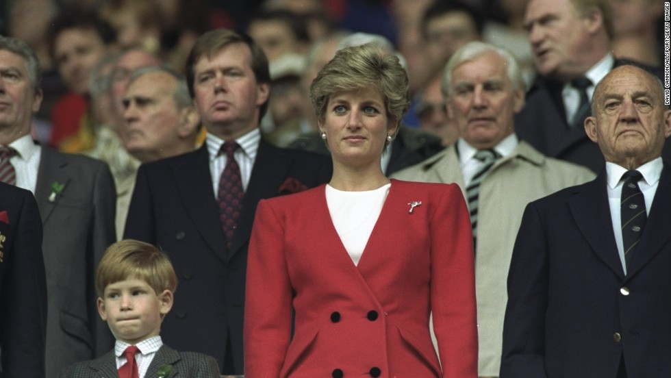 Prince Harry stands with Princess Diana for the national anthem at the Wales versus Australia match during the 1991 World Cup in Cardiff, Wales, on October 12, 1991. 
