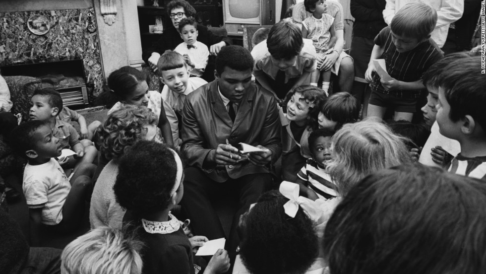 Ali visits a children&#39;s home in London in May 1966.