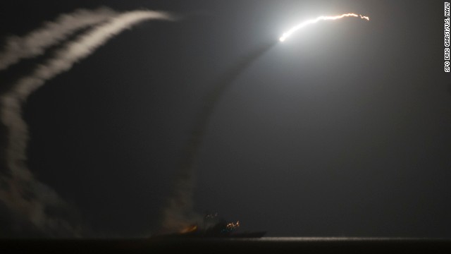 Tomahawk missiles, intended for ISIS targets in Syria, fly above the Persian Gulf after being fired by the USS Philippine Sea in this image released by the U.S. Navy on Tuesday, September 23.