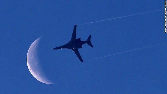 A U.S. Air Force plane flies above Kobani on Saturday, October 18.