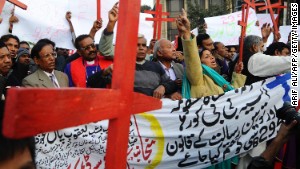 Members of the Pakistan Christian Democratic alliance march during a protest in Lahore on December 25, 2010, in support of Asia Bibi, a Christian mother sentenced to death under blasphemy laws. Arif Ali/AFP/Getty Images)