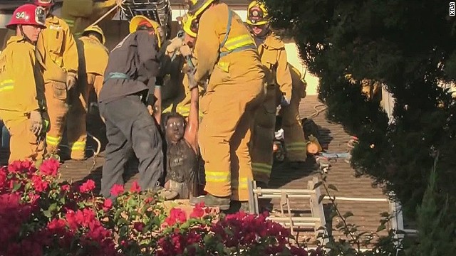 Watch moment woman found trapped in ex-boyfriends CHIMNEY 