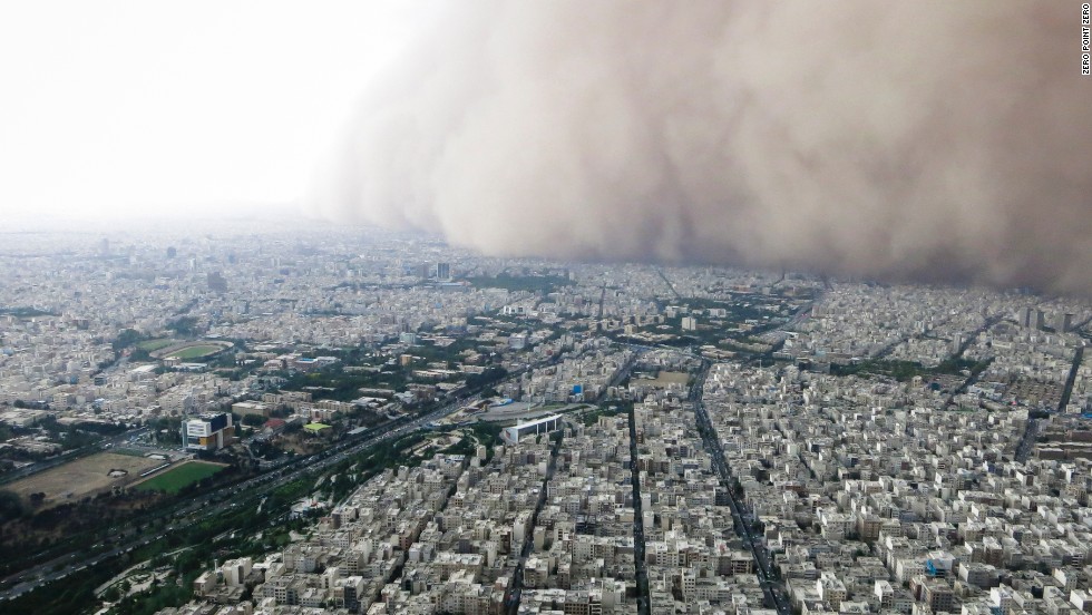 A intense sandstorm engulfs Tehran, seen from the top of the Milad Tower.