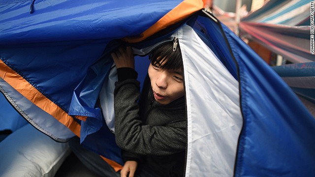 Hong Kong protesters remain on streets but allow government.