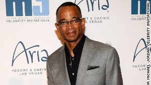 ESPN sportscaster Stuart Scott arrives at the 13th annual Michael Jordan Celebrity Invitational gala at the ARIA Resort & Casino at CityCenter on April 4, 2014 in Las Vegas, Nevada. 