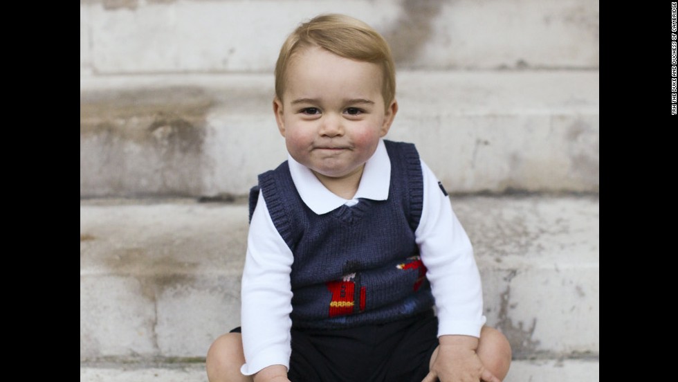In December 2014, the family released official Christmas photographs of Prince George. Here, he poses in a courtyard at Kensington Palace.