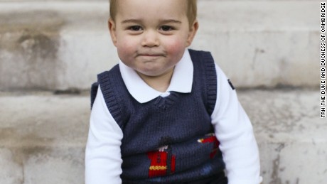 EMBARGOED TILL 5:30 ET 12/13/14.  The Duke and Duchess of Cambridge have released  official Christmas photographs of Prince George.The photographs, taken in late November, show Prince George in a courtyard at Kensington Palace.