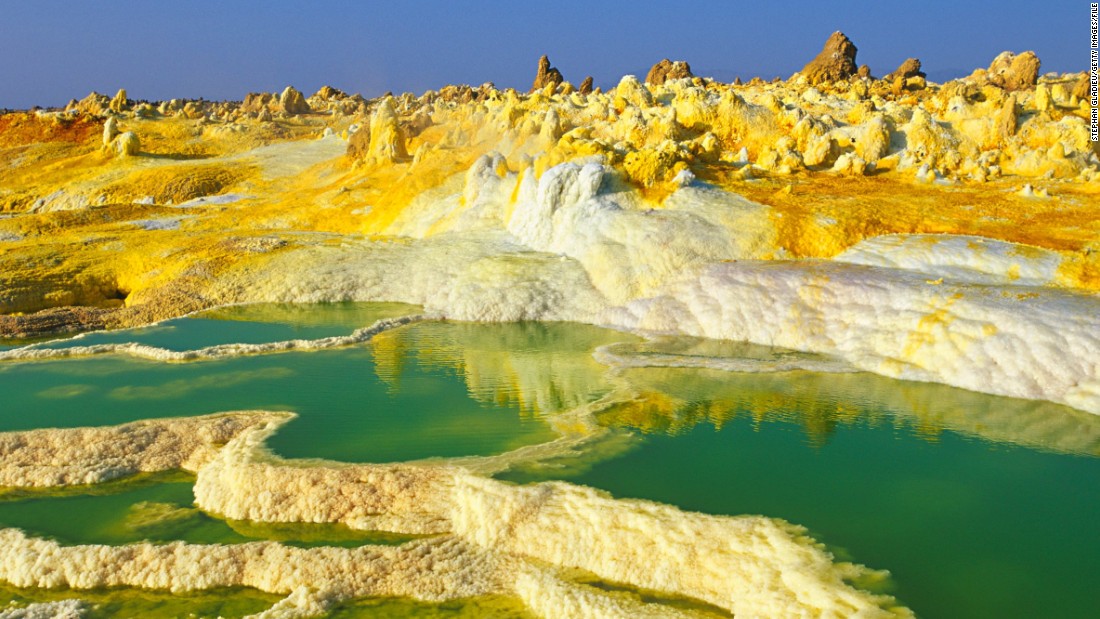 Mother Nature is not afraid to go technicolor for the right effect. These eye-catching landscapes are among the world's most vivid. Some are completely natural, while others have been helped along by humans. It's no easy feat to reach many of these spots, but they're all worth a closer look. <br /><strong><br />Dallol, Ethiopia </strong><br /><br />The Dallol hydrothermal field is northeast of the Erta Ale Range in one of the lowest and hottest areas of the desolate Danakil Depression in Ethiopia. The Dallol craters are the Earth's lowest known subaerial volcanic vents. Salty hot springs featuring a rich palette of colors dot the area. There are hot yellow sulphur fields among the white salt beds.
