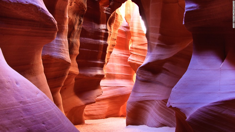 Some landscapes spring to life with light. The oranges, pinks and purples of Antelope Canyon near Page, Arizona, are amplified and muted by the changing sunlight filtering down from above, with the most intense colors emerging during the summer months. Antelope Canyon is the Southwest's most photographed slot canyon, formed by water slicing through a mesa. The sandstone canyon is on Navajo land, and guided tours are available.