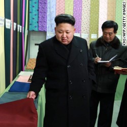 This undated picture released from North Korea&#39;s official Korean Central News Agency (KCNA) on December 21, 2014 shows North Korean leader Kim Jong-Un (L) visiting the Kim Jong-Suk Pyongyang Textile Mill in Pyongyang.    AFP PHOTO / KCNA via KNS    REPUBLIC OF KOREA OUT 
THIS PICTURE WAS MADE AVAILABLE BY A THIRD PARTY. AFP CAN NOT INDEPENDENTLY VERIFY THE AUTHENTICITY, LOCATION, DATE AND CONTENT OF THIS IMAGE. THIS PHOTO IS DISTRIBUTED EXACTLY AS RECEIVED BY AFP. 
---EDITORS NOTE--- RESTRICTED TO EDITORIAL USE - MANDATORY CREDIT &quot;AFP PHOTO / KCNA VIA KNS&quot; - NO MARKETING NO ADVERTISING CAMPAIGNS - DISTRIBUTED AS A SERVICE TO CLIENTSKNS/AFP/Getty Images
