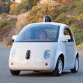 A fully working prototype of Google's self-driving includes cameras and a LIDAR system, but no permanent driver controls like a wheel. 