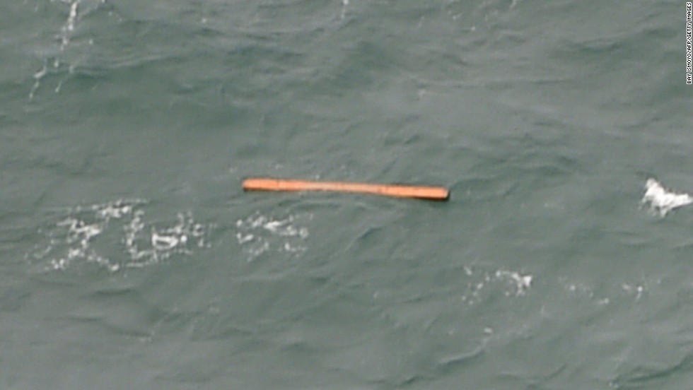 Debris floats in the Java Sea on December 30.