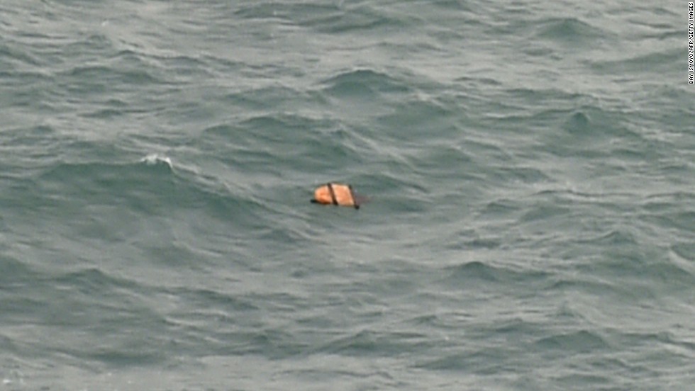 Debris floats in the Java Sea on December 30.