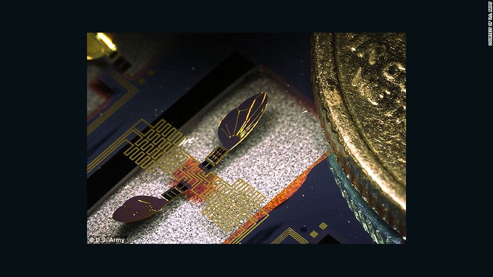 A &#39;robo-fly&#39; seen next to the edge of a dime for scale. While the team has shown that the project works in principle, it may take a further 10-15 years of research before the Army has a fully functional robotic surveillance insect. Researchers say more work is needed to establish algorithms that would allow a robotic insect to stabilize itself.