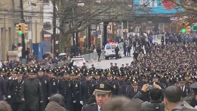 nr sot ganim thousands of police officers attend funeral _00001921