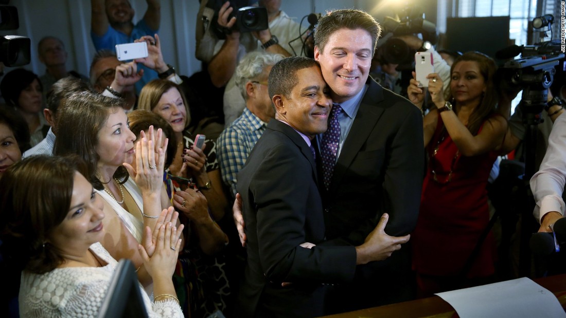 Newlyweds Jeff Delmay and Todd Delmay hug during a marriage ceremony in a Miami courtroom on Monday, January 5. Florida began allowing same-sex marriages after a judge -- following similar rulings across the nation -- struck down the state&#39;s old law banning such unions.