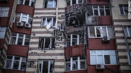 A building hit by Ukrainian artillery is seen in the Voroshilovsky area of Donetsk on January 18.