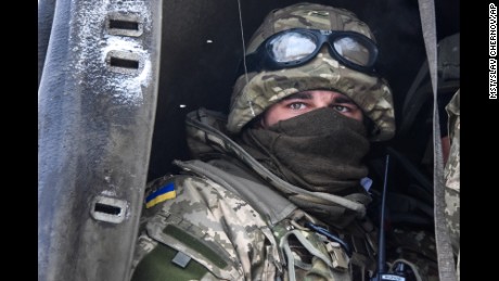 A Ukrainian soldier looks down from a military truck at the Donetsk airport on Tuesday, January 6. The airport has been the scene of some of the fiercest fighting in eastern Ukraine.