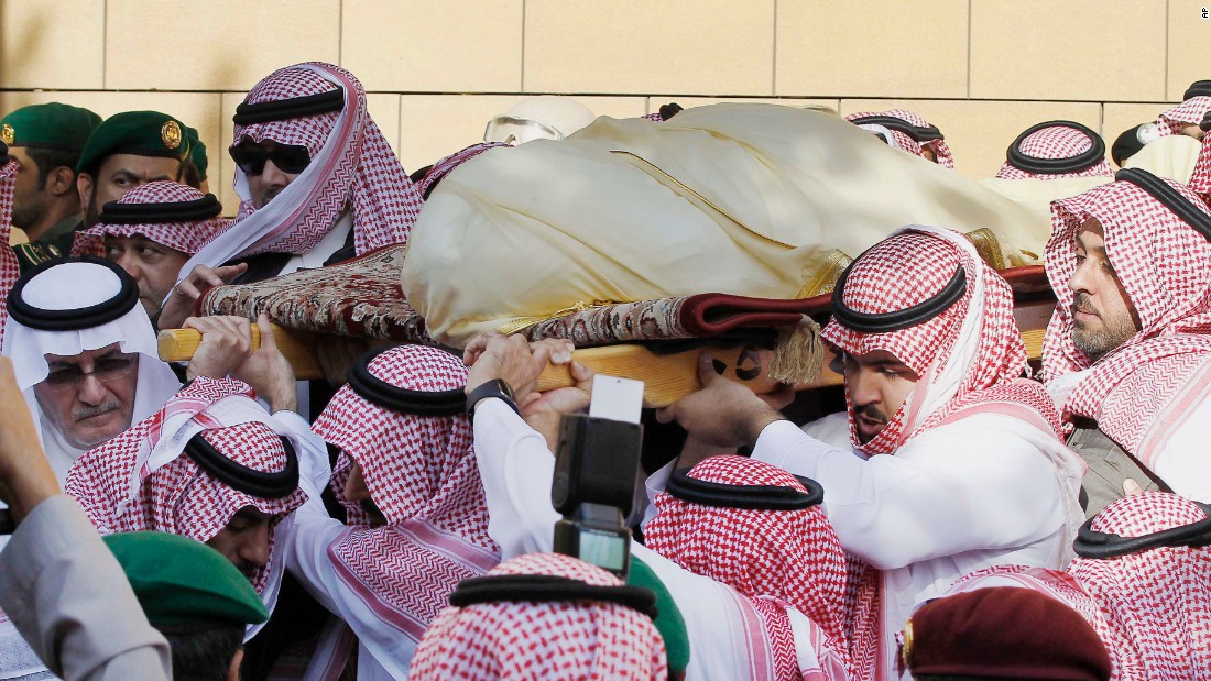 Mourners carry the King's body outside a mosque in Riyadh on January 23.
