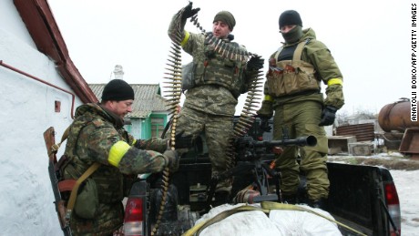 Ukrainian servicemen prepare ammunition at a position on the front line near Mariupol on January 26.