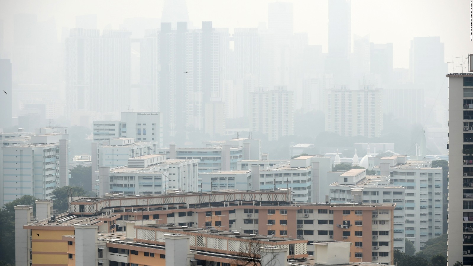 Singapore's financial business district covered with smog, on September 15, 2014. Offcials said air pollution hit unhealthy levels due to smog from fires raging across rainforests in Indonesia's neigboring Sumatara island.