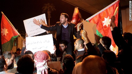 Jordanians gather in Amman on Tuesday, February 3, after reports that al-Kasasbeh had been killed.