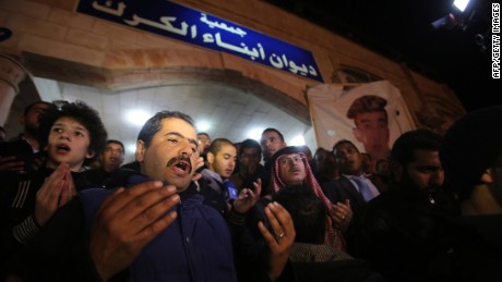 Supporters and family members say prayers on February 3. 