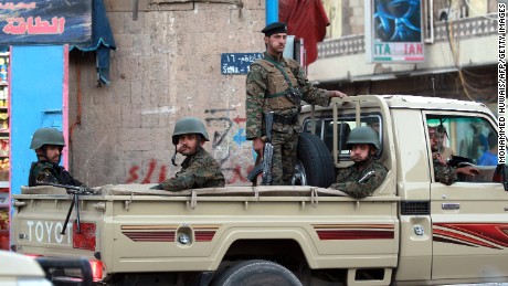 Yemeni soldiers guard the presidential palace in Sanaa on Friday, February 6.