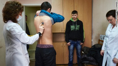 A volunteer gets a medical checkup at a military base for pro-Russian rebels February 10 in Donetsk, Ukraine.