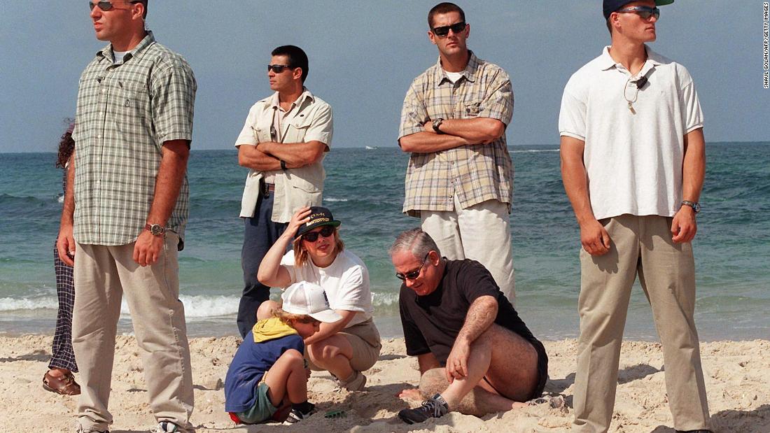 Netanyahu spends the day on the beach with his wife, Sara, and son Avner in Caesarea, Israel, on August 16, 1997. 
