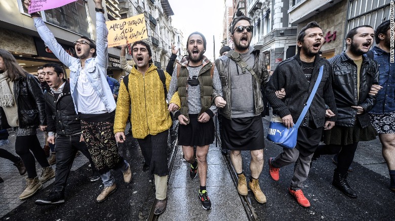 Turkish men wearing skirts demonstrate in Istanbul to support women&#39;s rights in memory of 20-year-old murdered woman Ozgecan Aslan on February 21, 2015.
