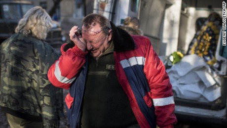 A member of a Ukrainian military medical unit cries during a ceremony in Artemivsk, Ukraine, on February 23. Four of his comrades were killed near Debaltseve, Ukraine.