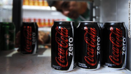 A customer picks a can of Coca-Cola Zero from a shelf in a supermarket in Caracas June 11, 2009. Coca-Cola pulled its no-calorie Coke Zero from shelves in Venezuela Thursday on Health Ministry orders, as the local bottler insisted it was safe to drink. The move took Zero, which has been sold in Venezuela for just a few months, out of all businesses nationwide, in this country led by leftist President Hugo Chavez, a staunch critic of the United States and market economics.   AFP PHOTO/Juan BARRETO (Photo credit should read JUAN BARRETO/AFP/Getty Images)