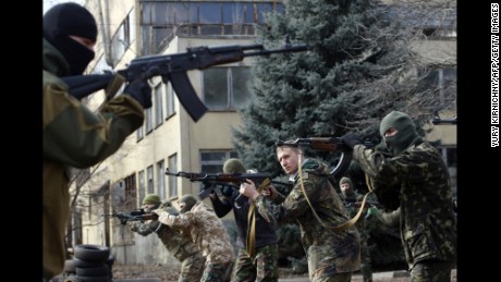 An instructor of the Ukrainian volunteer Azov Battalion conducts training exercises in Kiev, Ukraine, on Sunday, March 1.