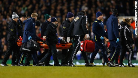 LONDON, ENGLAND - MARCH 04:  Bafetibis Gomis of Swansea City is stretchered off during the Barclays Premier League match between Tottenham Hotspur and Swansea City at White Hart Lane on March 4, 2015 in London, England.  (Photo by Steve Bardens/Getty Images)