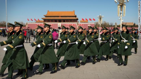 Paramilitary policemen march in formation across Tiananmen Square in Beijing Wednesday, March 4, 2015. Thousands of delegates from all over the country are in the Chinese capital this week to attend the Chinese People&#39;s Political Consultative Conference and the National People&#39;s Congress. (AP Photo/Mark Schiefelbein)