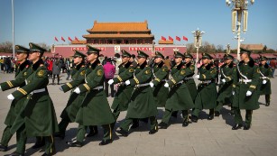 Paramilitary policemen march in formation across Tiananmen Square in Beijing Wednesday, March 4, 2015. Thousands of delegates from all over the country are in the Chinese capital this week to attend the Chinese People&#39;s Political Consultative Conference and the National People&#39;s Congress. (AP Photo/Mark Schiefelbein)