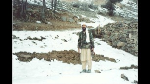 Osama bin Laden holds a Kalashnikov rifle in Tora Bora, a mountainous area of Afghanistan, in November 1996. This remarkable set of photos -- the first showing bin Laden in the remote hideout where he would seek refuge after 9/11 -- came to light only last month in the terrorism conspiracy trial of bin Laden lieutenant Khaled al-Fawwaz. Al-Fawwaz was a communications conduit for al Qaeda in London during the mid-1990s.