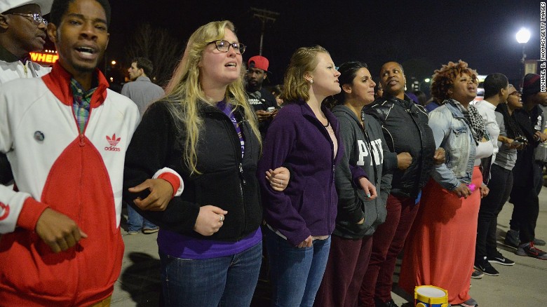 Tensions calm in Ferguson, Missouri, but call for change continues