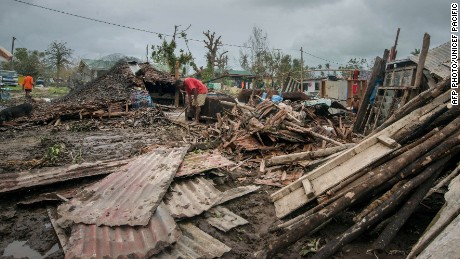 This handout photo taken and received on March 15, 2015 by UNICEF Pacific shows scattered debris outside local homes after the area was badly damaged by Cyclone Pam, outside the Vanuatu capital of Port Vila. Cyclone-devastated Vanuatu declared a state of emergency on March 15 as relief agencies scrambled to get help to the remote Pacific nation amid reports entire villages were &quot;blown away&quot; when the monster storm swept through. AFP PHOTO / UNICEF Pacific
---EDITORS NOTE--- RESTRICTED TO EDITORIAL USE - MANDATORY CREDIT &quot;AFP PHOTO / UNICEF Pacific&quot; - NO MARKETING NO ADVERTISING CAMPAIGNS - DISTRIBUTED AS A SERVICE TO CLIENTS - NO ARCHIVESUNICEF Pacific/AFP/Getty Images
