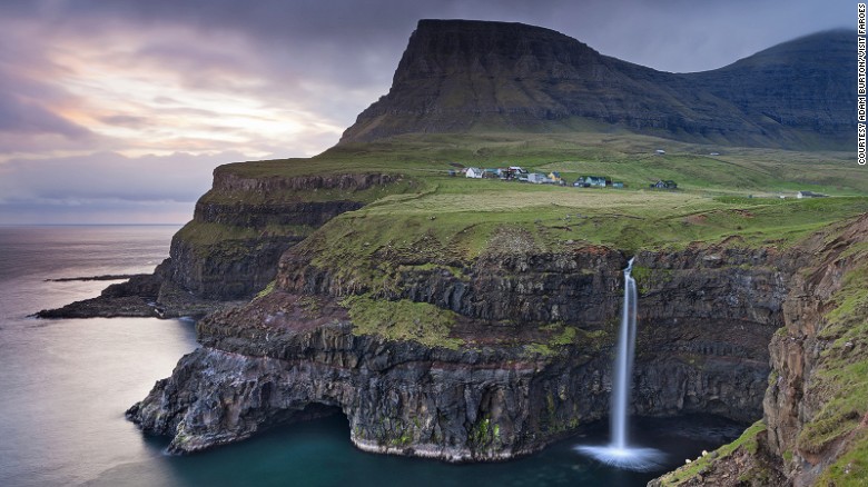 On the west side of Vagar, &lt;a href=&quot;http://www.visitvagar.fo/UK/index.asp?pID={3EE9C2B1-4520-4A83-9771-6A61E4844D6E}&quot; target=&quot;_blank&quot;&gt;Gasadalur&lt;/a&gt; sits next to a stunning waterfall. Prior to a tunnel opening in 2004, the village&#39;s 16 residents had to hike or horseback over the steep mountain to reach the rest of the island.