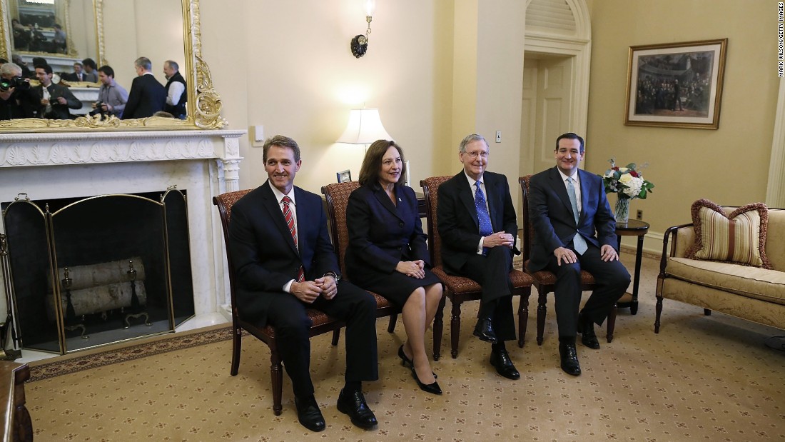 Then-Senate Minority Leader Mitch McConnell (second right), poses with Republican senators-elect Jeff Flake (left), Deb Fischer (second left), and Cruz (right) at the U.S. Capitol on November 13, 2012, in Washington, D.C.