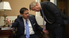 Rubio, left, talks to Sen. Lindsey Graham prior to a news conference on Capitol Hill in July.