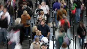 People stand in line at a security point at Denver International Airport, Tuesday, Dec. 21, 2010. 