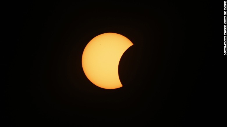 An eclipse is darkening parts of Europe on Friday in a rare solar event that won't be repeated for more than a decade.