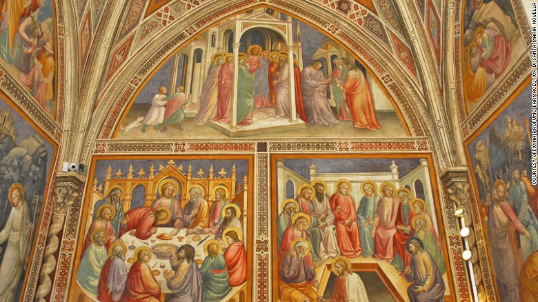 The pharmacy's library still carries 14th century frescoes from when it was a church sacristy.