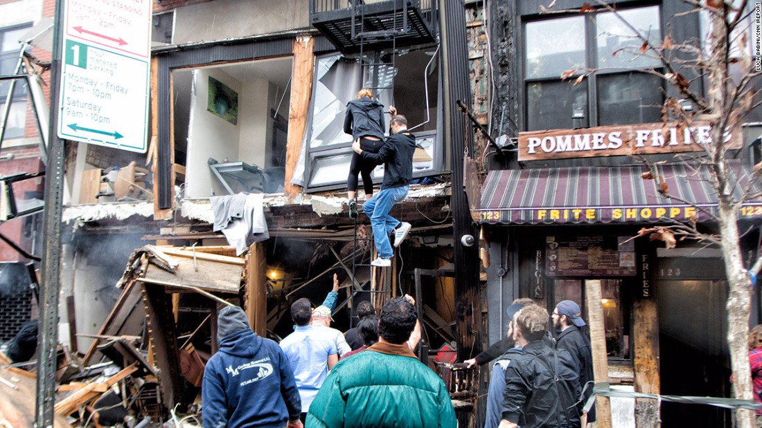 Explosion rocks New York City; building collapses - CNN.