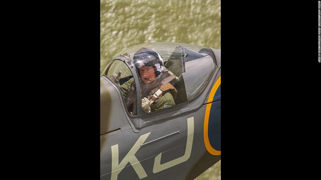 Prince Harry flies in the back of a Spitfire on a sortie from Goodwood, West Sussex, via the Isle of Wight in this undated photo released April 5.